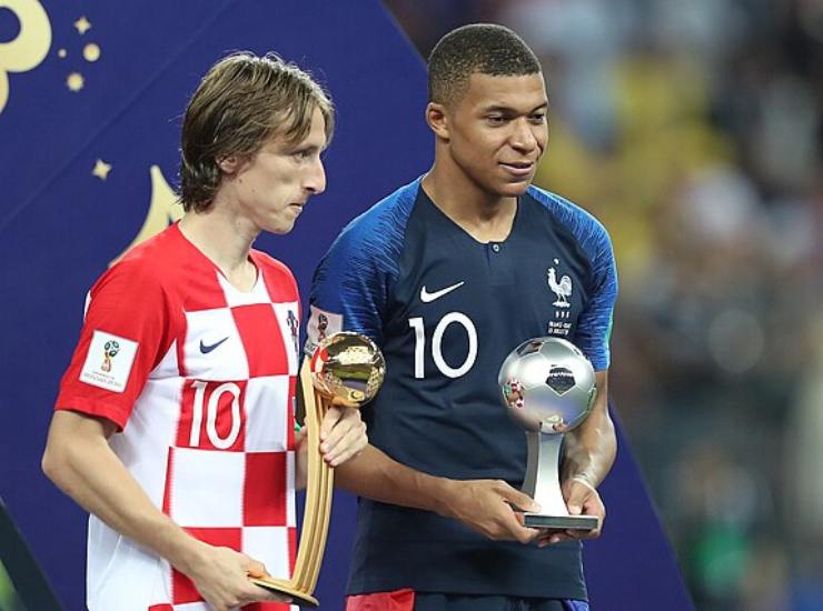 Luka Modric e Kylian Mbappé